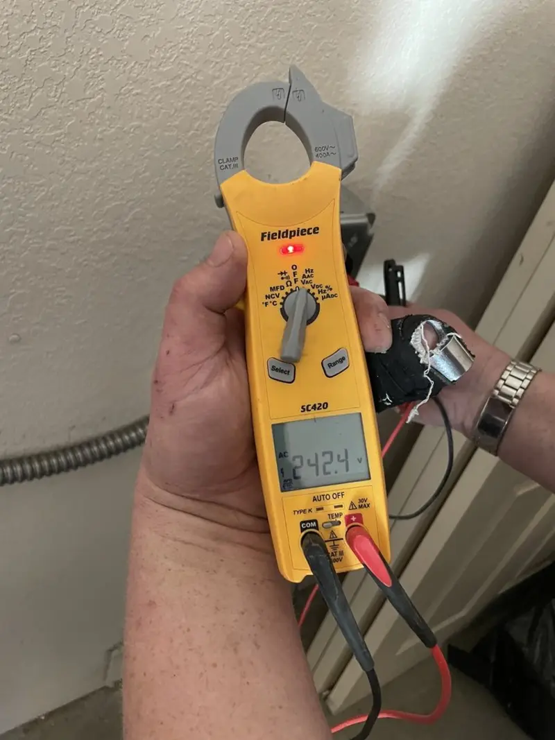 Voltage testing with clamp meter during Generator Installation in Crescent City